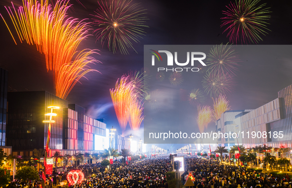 Fireworks and a drone show light up the midnight sky over Lusail Boulevard during the 2025 New Year's Day celebrations in Doha, Qatar, on Ja...