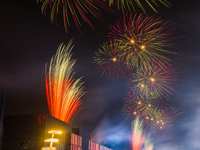 Fireworks and a drone show light up the midnight sky over Lusail Boulevard during the 2025 New Year's Day celebrations in Doha, Qatar, on Ja...