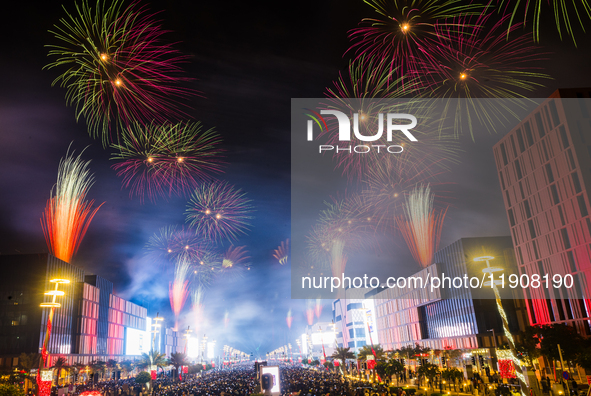 Fireworks and a drone show light up the midnight sky over Lusail Boulevard during the 2025 New Year's Day celebrations in Doha, Qatar, on Ja...