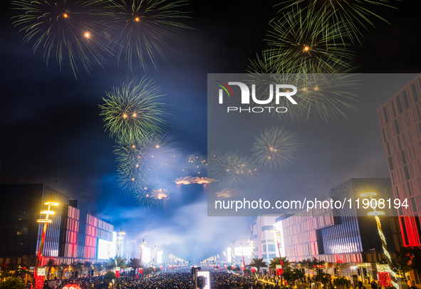 Fireworks and a drone show light up the midnight sky over Lusail Boulevard during the 2025 New Year's Day celebrations in Doha, Qatar, on Ja...