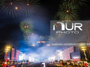 Fireworks and a drone show light up the midnight sky over Lusail Boulevard during the 2025 New Year's Day celebrations in Doha, Qatar, on Ja...