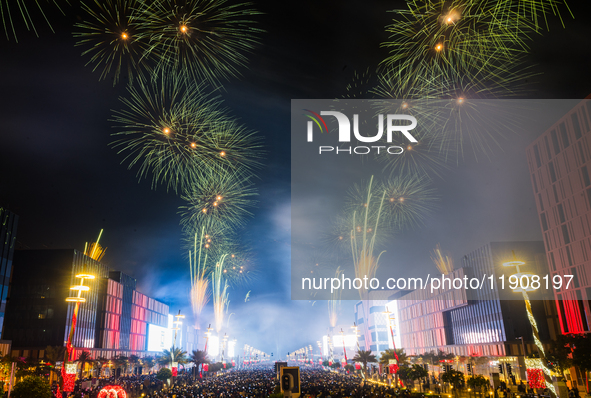 Fireworks and a drone show light up the midnight sky over Lusail Boulevard during the 2025 New Year's Day celebrations in Doha, Qatar, on Ja...