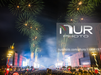 Fireworks and a drone show light up the midnight sky over Lusail Boulevard during the 2025 New Year's Day celebrations in Doha, Qatar, on Ja...