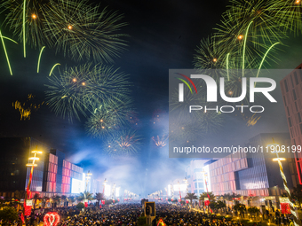 Fireworks and a drone show light up the midnight sky over Lusail Boulevard during the 2025 New Year's Day celebrations in Doha, Qatar, on Ja...