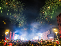 Fireworks and a drone show light up the midnight sky over Lusail Boulevard during the 2025 New Year's Day celebrations in Doha, Qatar, on Ja...