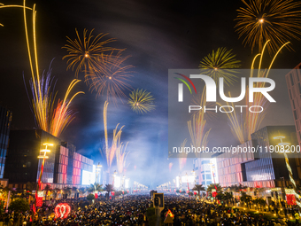 Fireworks and a drone show light up the midnight sky over Lusail Boulevard during the 2025 New Year's Day celebrations in Doha, Qatar, on Ja...