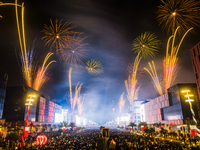 Fireworks and a drone show light up the midnight sky over Lusail Boulevard during the 2025 New Year's Day celebrations in Doha, Qatar, on Ja...