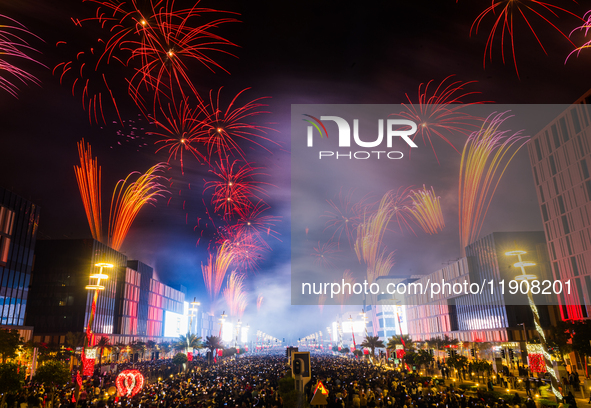 Fireworks and a drone show light up the midnight sky over Lusail Boulevard during the 2025 New Year's Day celebrations in Doha, Qatar, on Ja...