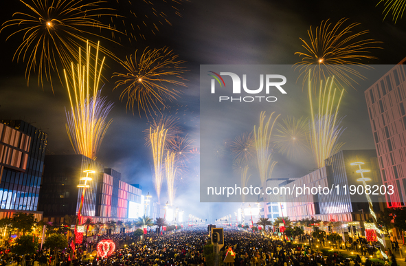 Fireworks and a drone show light up the midnight sky over Lusail Boulevard during the 2025 New Year's Day celebrations in Doha, Qatar, on Ja...