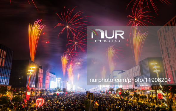 Fireworks and a drone show light up the midnight sky over Lusail Boulevard during the 2025 New Year's Day celebrations in Doha, Qatar, on Ja...