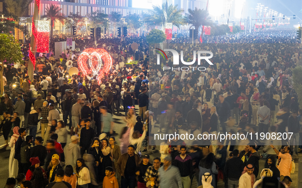 People gather at Lusail Boulevard during New Year's Day celebrations in Doha, Qatar, on January 1, 2025. 