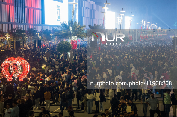 People gather at Lusail Boulevard during New Year's Day celebrations in Doha, Qatar, on January 1, 2025. 