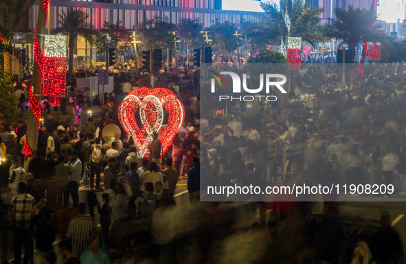 People gather at Lusail Boulevard during New Year's Day celebrations in Doha, Qatar, on January 1, 2025. 