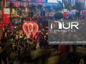 People gather at Lusail Boulevard during New Year's Day celebrations in Doha, Qatar, on January 1, 2025. (