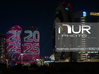 An LED screen on a building displays ''2025'' in Lusail Boulevard during New Year's Day celebrations in Doha, Qatar, on January 1, 2025. (