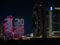 An LED screen on a building displays ''2025'' in Lusail Boulevard during New Year's Day celebrations in Doha, Qatar, on January 1, 2025. (