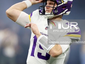 DETROIT,MICHIGAN-JANUARY 5:  Quarterback Brett Rypien (19) of the Minnesota Vikings throws the ball ahead of a game between the Detroit Lion...