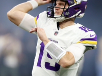 DETROIT,MICHIGAN-JANUARY 5:  Quarterback Brett Rypien (19) of the Minnesota Vikings throws the ball ahead of a game between the Detroit Lion...