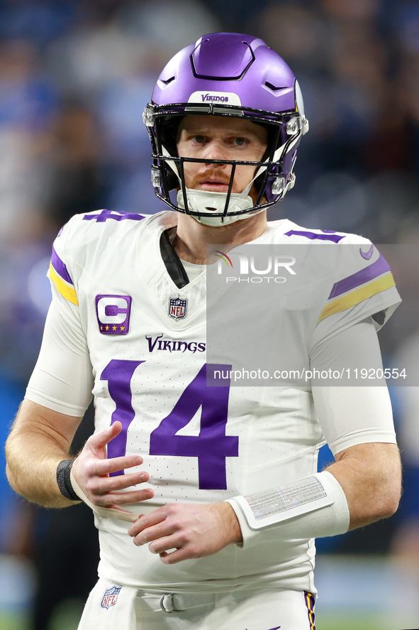 DETROIT,MICHIGAN-JANUARY 5:  Quarterback Sam Darnold (14) of the Minnesota Vikings walks on the field ahead of a game between the Detroit Li...