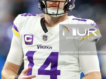 DETROIT,MICHIGAN-JANUARY 5:  Quarterback Sam Darnold (14) of the Minnesota Vikings walks on the field ahead of a game between the Detroit Li...