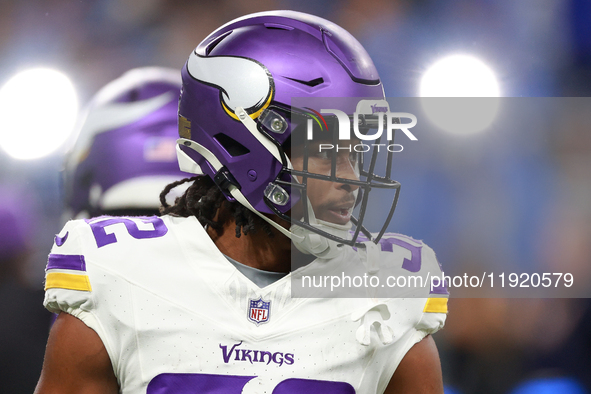 DETROIT,MICHIGAN-JANUARY 5:  Running back Ty Chandler (32) of the Minnesota Vikings walks on the field ahead of a game between the Detroit L...