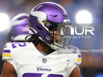 DETROIT,MICHIGAN-JANUARY 5:  Running back Ty Chandler (32) of the Minnesota Vikings walks on the field ahead of a game between the Detroit L...