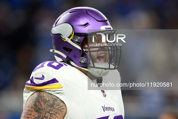 DETROIT,MICHIGAN-JANUARY 5: Guard Dalton Risner (66) of the Minnesota Vikings walks on the field ahead of a game between the Detroit Lions a...