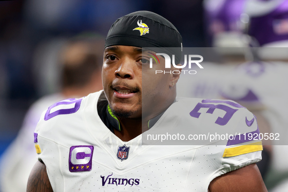 DETROIT,MICHIGAN-JANUARY 5:  Fullback C.J. Ham (30) of the Minnesota Vikings walks on the field ahead of a game between the Detroit Lions an...