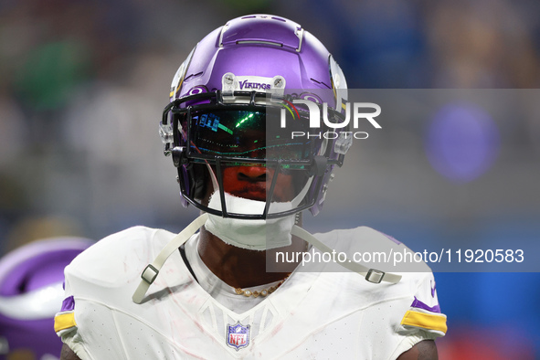 DETROIT,MICHIGAN-JANUARY 5: Wide receiver Brandon Powell (4) of the Minnesota Vikings walks on the field ahead of  a game between the Detroi...