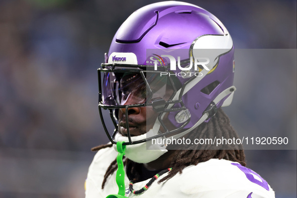 DETROIT,MICHIGAN-JANUARY 5:  Linebacker Brian Asamoah II (6) of the Minnesota Vikings walks on the field ahead of a game between the Detroit...