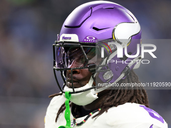 DETROIT,MICHIGAN-JANUARY 5:  Linebacker Brian Asamoah II (6) of the Minnesota Vikings walks on the field ahead of a game between the Detroit...