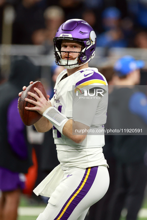 DETROIT,MICHIGAN-JANUARY 5:  Quarterback Sam Darnold (14) of the Minnesota Vikings looks to throw the ball ahead of a game between the Detro...