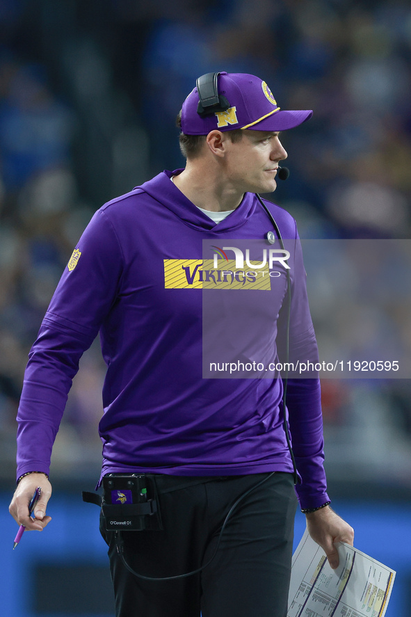 DETROIT,MICHIGAN-JANUARY 5:  Minnesota head coach Kevin O'Connell walks on the sidelines  during a game between the Detroit Lions and the Mi...