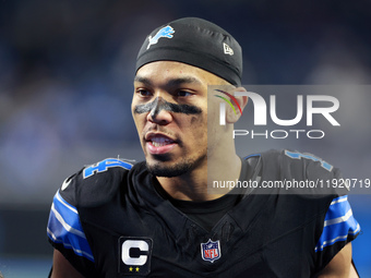 DETROIT,MICHIGAN-JANUARY 5:  Wide receiver Amon-Ra St. Brown (14) of the Detroit Lions walks off of the field at the conclusion of a game be...