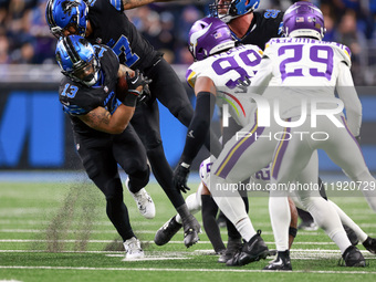 DETROIT,MICHIGAN-JANUARY 5:  Running back Craig Reynolds (13) of the Detroit Lions carries the ball during a game between the Detroit Lions...