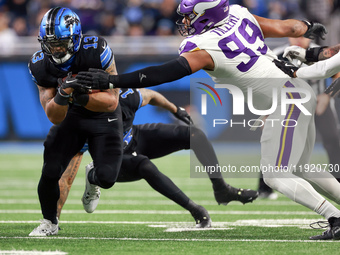 DETROIT,MICHIGAN-JANUARY 5:  Running back Craig Reynolds (13) of the Detroit Lions carries the ball during a game between the Detroit Lions...