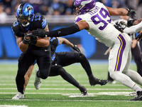 DETROIT,MICHIGAN-JANUARY 5:  Running back Craig Reynolds (13) of the Detroit Lions carries the ball during a game between the Detroit Lions...