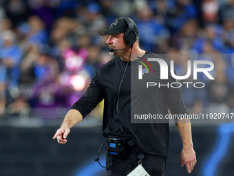 DETROIT,MICHIGAN-JANUARY 5:  Detroit Lions head coach Dan Campbell walks on the sidelines during a game between the Detroit Lions and the Mi...