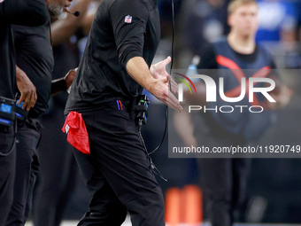 DETROIT,MICHIGAN-JANUARY 5:  Head coach Dan Campbell of the Detroit Lions reacts during a game between the Detroit Lions and the Minnesota V...