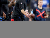 DETROIT,MICHIGAN-JANUARY 5:  Head coach Dan Campbell of the Detroit Lions reacts during a game between the Detroit Lions and the Minnesota V...