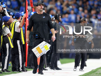 DETROIT,MICHIGAN-JANUARY 5:  Head coach Dan Campbell of the Detroit Lions walks on the sidelines during a game between the Detroit Lions and...