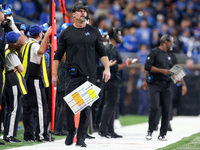 DETROIT,MICHIGAN-JANUARY 5:  Head coach Dan Campbell of the Detroit Lions walks on the sidelines during a game between the Detroit Lions and...