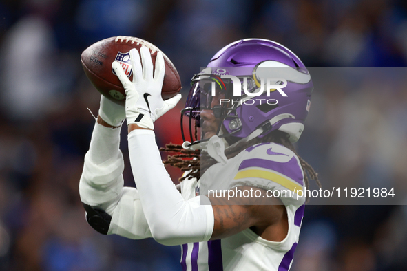 DETROIT,MICHIGAN-JANUARY 5:  Safety Jay Ward (20) of the Minnesota Vikings catches the ball ahead of a game between the Detroit Lions and th...