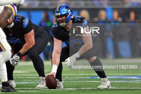 DETROIT,MICHIGAN-JANUARY 5:  Center Frank Ragnow (77) of the Detroit Lions prepares to snap the ball during a game between the Detroit Lions...