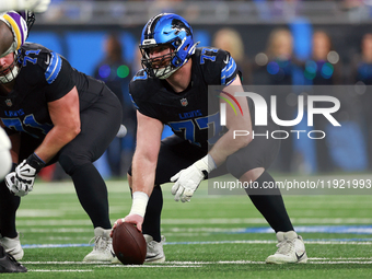 DETROIT,MICHIGAN-JANUARY 5:  Center Frank Ragnow (77) of the Detroit Lions prepares to snap the ball during a game between the Detroit Lions...