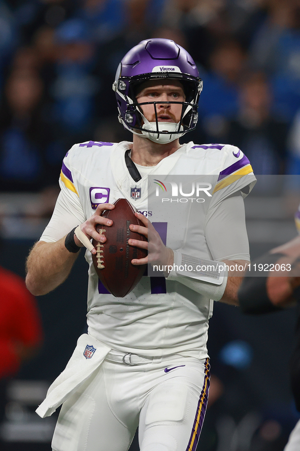 DETROIT,MICHIGAN-JANUARY 5:  Quarterback Sam Darnold (14) of the Minnesota Vikings looks to pass the ball during a game between the Detroit...