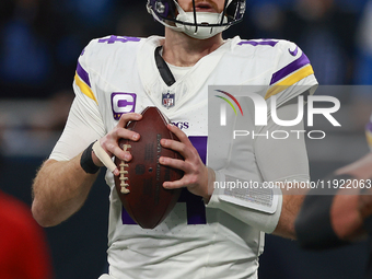 DETROIT,MICHIGAN-JANUARY 5:  Quarterback Sam Darnold (14) of the Minnesota Vikings looks to pass the ball during a game between the Detroit...