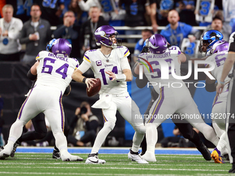 DETROIT,MICHIGAN-JANUARY 5:  Quarterback Sam Darnold (14) of the Minnesota Vikings looks to pass the ball during a game between the Detroit...