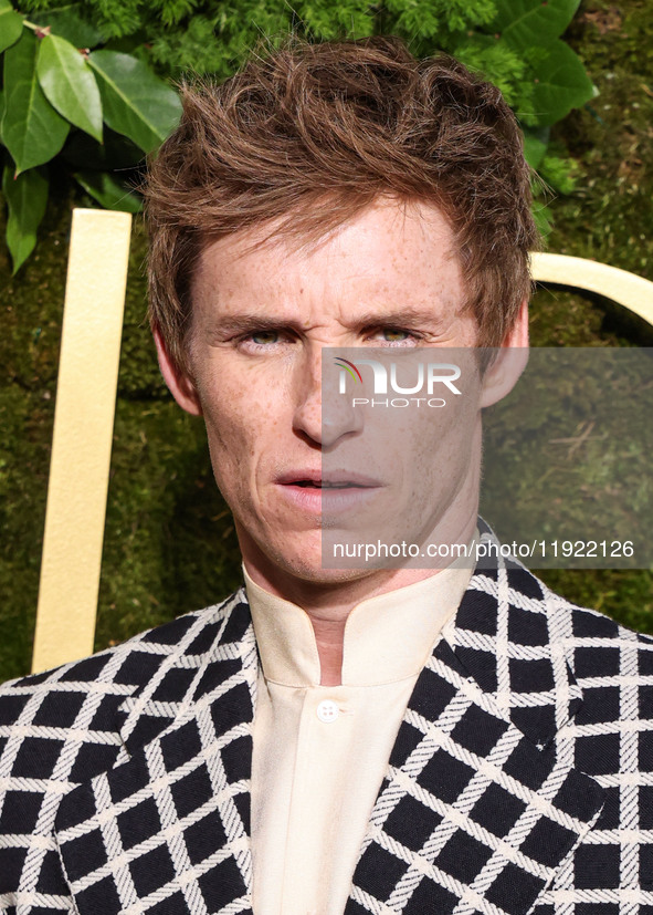 Eddie Redmayne wearing Valentino with an Omega watch arrives at the 82nd Annual Golden Globe Awards held at The Beverly Hilton Hotel on Janu...