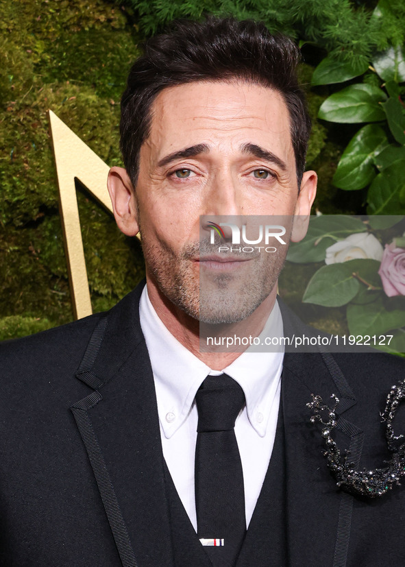 Adrien Brody wearing Thom Browne arrives at the 82nd Annual Golden Globe Awards held at The Beverly Hilton Hotel on January 5, 2025 in Bever...